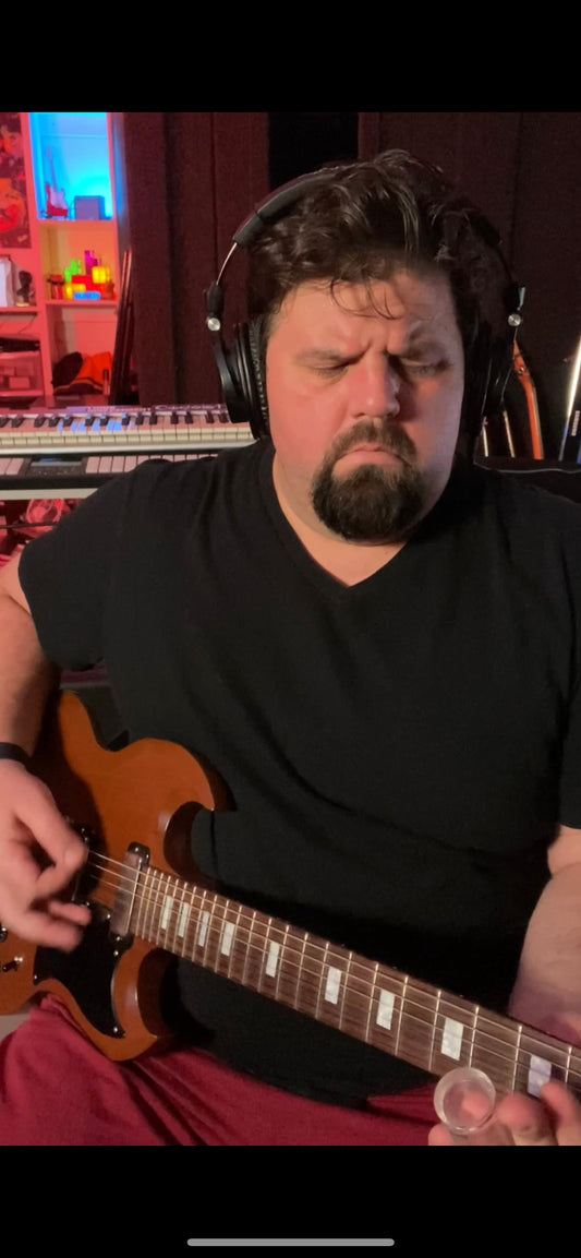 Brandon Gass rocks a dirty blues rock riff on his Gibson SG